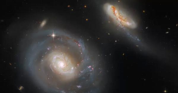 Hubble сделал потрясающие снимки взаимодействия двух галактик в 200 миллионах световых лет от Земли - Общество